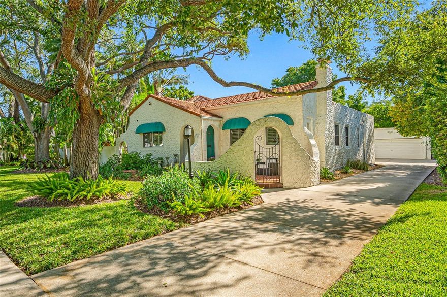 Welcome to Parkland Estates, one of South Tampa’s most treasured neighborhoods, ideally located between Hyde Park and Palma Ceia’s exclusive Golf View neighborhoods. Parkland Estates is in a category of its own. No where in Tampa is there a more impressive canopy of grand oaks, providing shade to almost every street, sidewalk & park. Beneath these canopies you’ll find some of Tampa’s most exquisite residences that span more than a century in age. Just a five minute walk to the bustling dining corridor along Howard Avenue and less than a mile to Bayshore Blvd & Hyde Park Village. We’re proud to present 804 S. Lakeview Rd, a 1921 constructed mediterranean revival situated on one of a select few TRUE DOUBLE LOTS and boasting nearly 20,000 SF of grounds. As you meander through the ~3,000 SF residence you’ll discover a pleasant surprise around every corner. The enclosed front private patio is accented by a wrought iron gate and offers ample room for front porch parties. Step inside to find yourself in awe: “The Rose Room” features thousands of hand carved roses engulfing the cathedral ceiling and walls. The fireplace, equipped for gas or wood, is an equally impressive work of art to marvel at as you ponder the generations of fireside discussions that have taken place here. The bouquet continues into the formal dining room where French doors give you your first sneak peak at the elaborate gardens and pathways that wind through the nearly 1/2 acre home site. Pass through the stained glass kitchen door to find an elaborate kitchen where all of your modern culinary needs are met, including double ovens, breakfast bar, stainless steel appliance package and an additional dining nook. Behold, an illuminated art installation the size of a door… dubbing as an entrance to a hidden powder room! After dinner, retire to the grand octagon. This thoughtful addition with soaring 25 foot ceilings is the perfect setting for an after dinner night cap or clear the furniture for the ultimate disco party. In the southern wing of the home, original solid wood floors lead to two spacious junior bedrooms which share a bathroom equipped with shower and tub. The rear facing primary suite was expanded to offer a walk in closet, bonus space for reading or exercise, and direct access to the rear patio. 
Tranquility & privacy are yours as you step into the Zen inspired oasis out back. Reset your parasympathetic nervous system daily in a setting prime for yoga, meditation & cold plunges. Host a group work out, BBQ or pool party just in time for summer. The lagoon style pool blends naturally with the landscape with a wrap around bench for little ones learning to swim. Marvel at the many species of lush plants and trees which attract birds and butterflies creating a whimsical experience. 
The detached casita will comfortably accommodate your overnight guests or serve as home office or hobby room. The adjacent oversized 2 car garage has bonus space for a tool bench and the 100+ ft driveway will accommodate parking for as many as 10 vehicles if needed. 


For developers or those intrigued mostly by the true double lot and with custom needs please speak with the agent for more information about the survey, the cability of a lot split, tree evaluation or for introductions to preferred local builders with specific Parkland Estates experience.