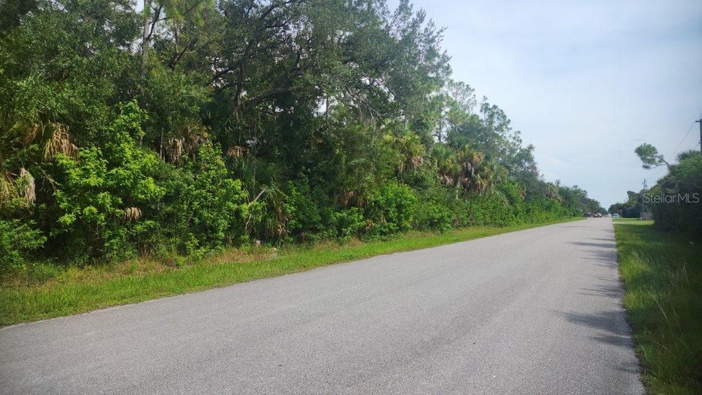 Photo of 68 Ellington Street, Port Charlotte, FL 33953 (MLS # C7529210)