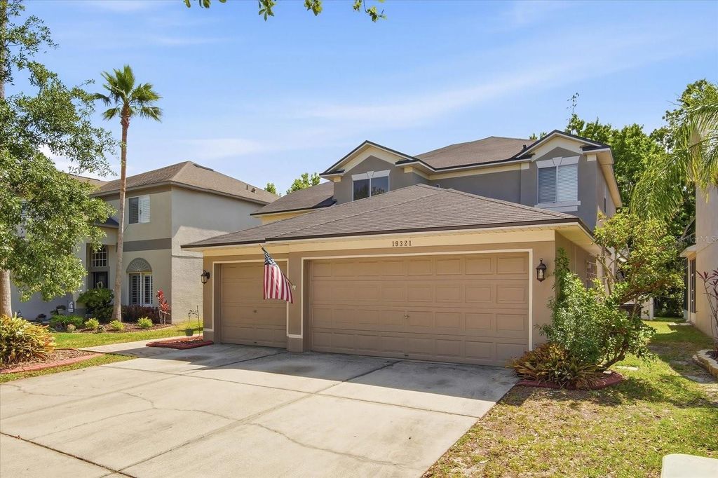 Photo of 19321 Sandy Springs Circle, Lutz, FL 33558 (MLS # TB8504276)