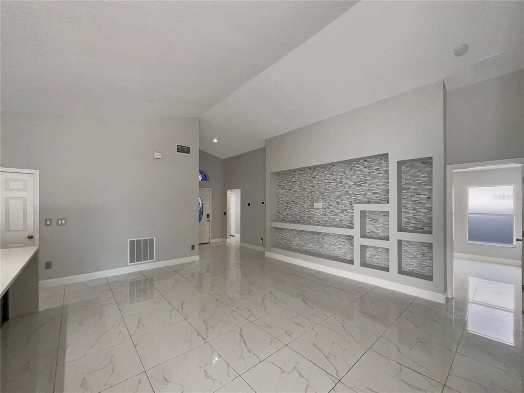 Photo of 1009 Brayton Lane, Davenport, FL 33897 (MLS # O6371306)