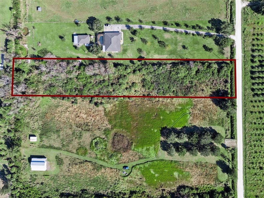 2.69 acres of buildable land ready for your dream residence! No online evidence of wetlands or flood zone (see attached survey). Located at the east end of the street, just minutes away from Scottsmoor Landing- a top fishing launch on the Indian River. Property fronts a county road.