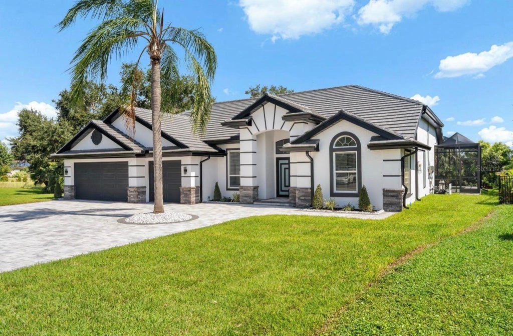 Photo of 9701 Port Colony Way, Tampa, FL 33615 (MLS # TB8555688)