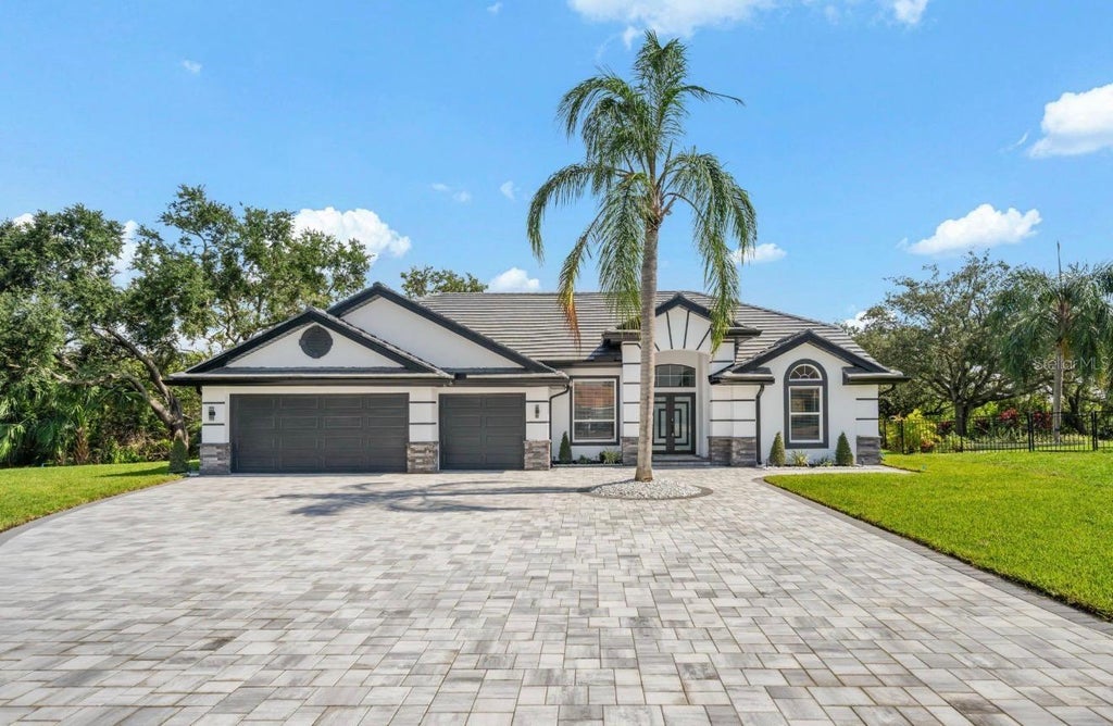 Photo of 9701 Port Colony Way, Tampa, FL 33615 (MLS # TB8555688)