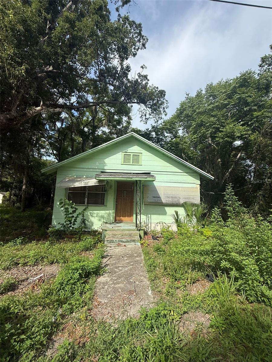 This two-bedroom, one-bath home offers a rare opportunity for a complete renovation tailored to your vision. Situated on a quiet lot, it features a rear porch perfect for relaxing and a shed for additional storage. Whether you're an investor or a homeowner ready to take on a full-scale project, this property has solid potential to be transformed. Don’t miss this chance to make it your own.