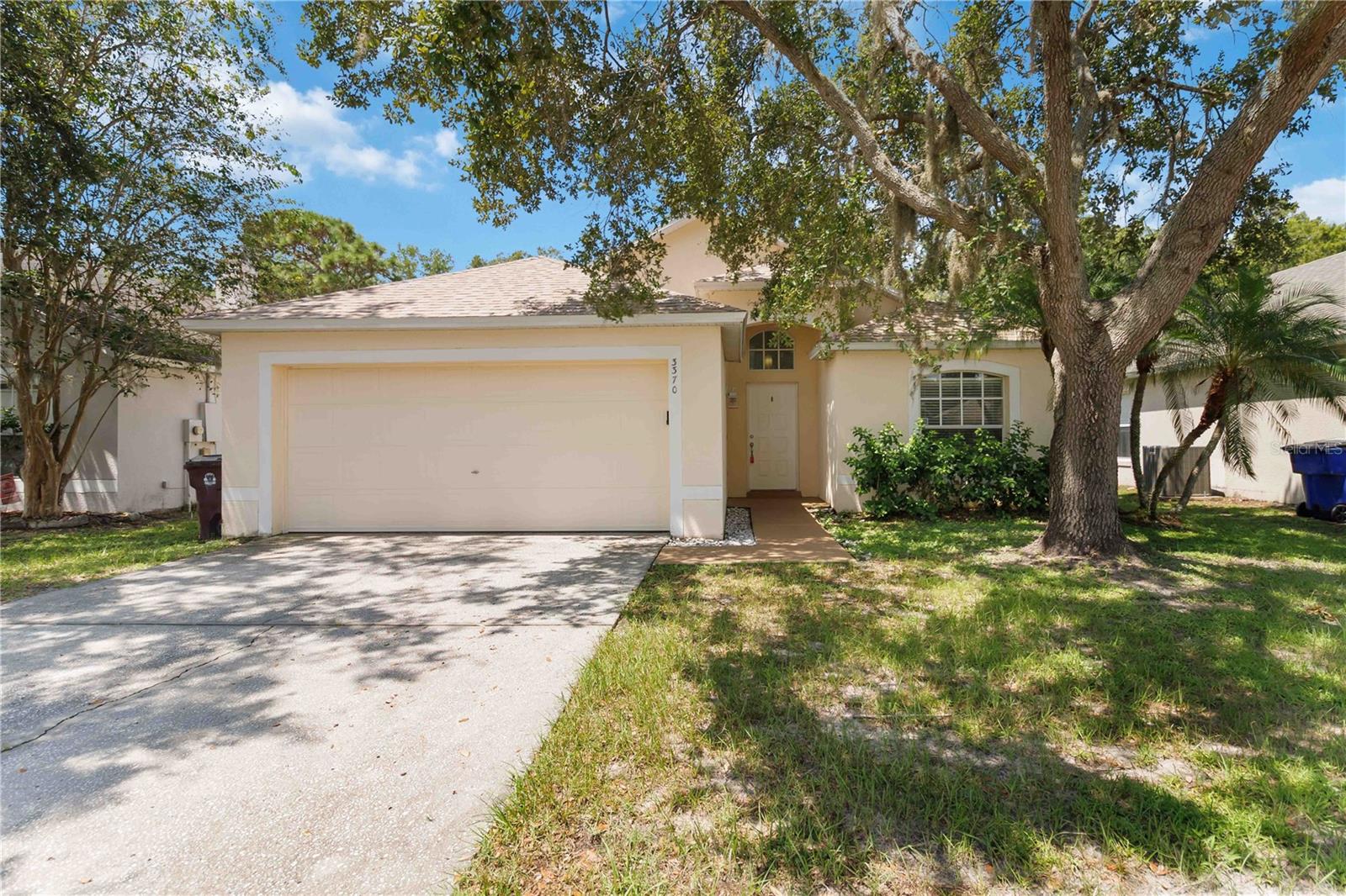 Welcome to this well-maintained 3 bedroom, 2 bathroom home offering 1200 sq ft of comfortable living space in the desirable Cypress Point community. Perfectly situated in a quiet, conservative neighborhood, this home is ideal for familes, first time buyers, or those seeking a vacation retreat. Inside you will find a bright, open layout with a spacious living area, functional kitchen, and comfortable bedrooms, including a primary suit with its own private bath. Step outside and enjoy the community's family-friendly amenties, including sidewalk-lined streets perfect for evening walks, a playground, and well kept common areas. Located just minutes from Walt Disney, SeaWorld, shopping, dining and entertainment, this home offers easy access to all the excitement Central Florida has to offer. Dont miss your chance to own a charming home in one of the most convenient location in the area.