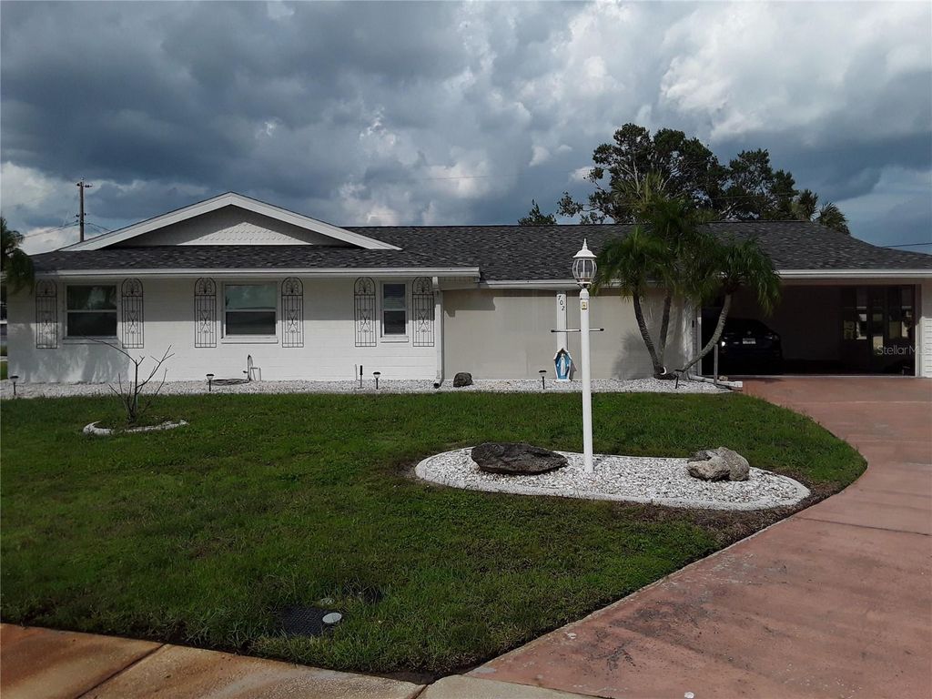 Photo of 702 Cypress Place, Sun City Center, FL 33573 (MLS # TB8401429)