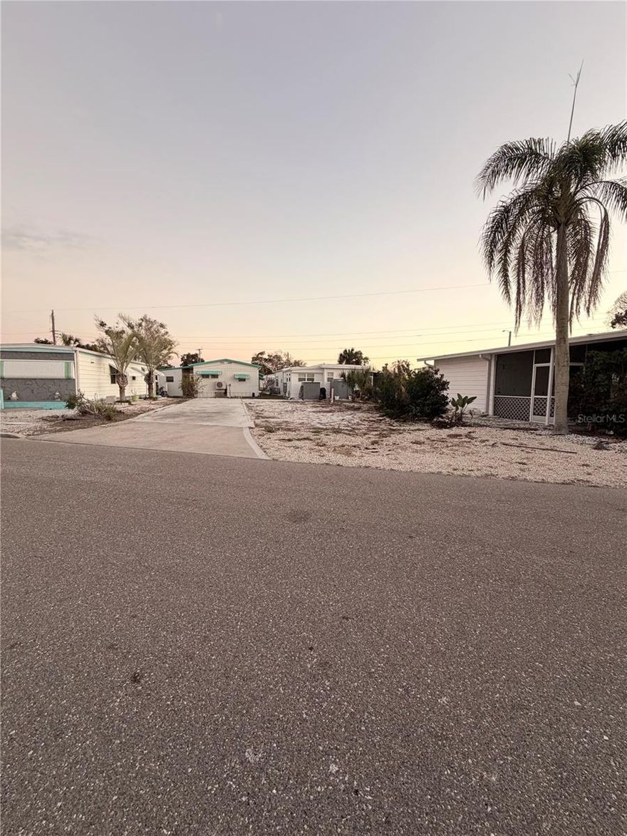 Build Your Florida Lifestyle Dreams in a vibrant 55+ waterfront community where you own the land! This vacant lot offers a marina view and is ready for a new manufactured home. Located in a highly active, activity rich, golf cart community with a super low HOA annual fee. Residents enjoy an impressive list of amenities including a pool and spa, pickleball courts, fitness center, woodworking facility, on-site post office, and so much more. Boat slip rentals are available. Conveniently close to shopping, dining, beaches, and the SRQ airport. This could be your year to make your dreams come true!
