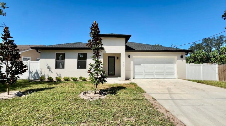 Photo 1 of 35 — 707 W COUNTRY CLUB DRIVE, TAMPA, FL 33612
