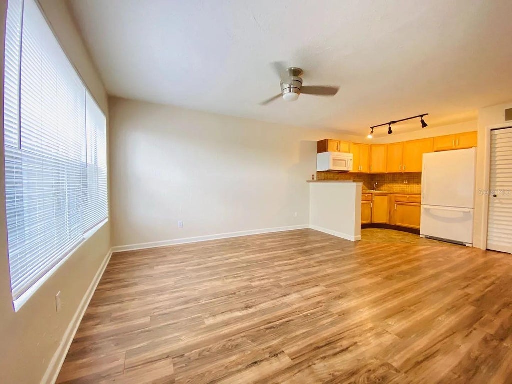 Photo of 4704 Walden Circle #26, Orlando, FL 32811 (MLS # O6444969)