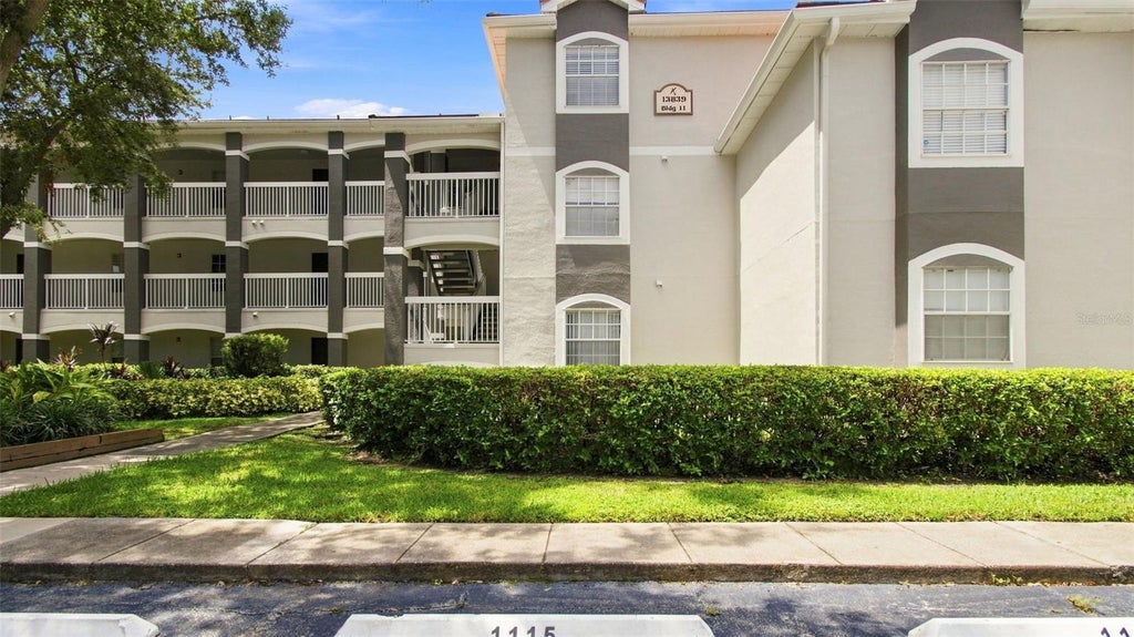 Photo of 13839 Fairway Island Drive #1136, Orlando, FL 32837 (MLS # TB8545439)
