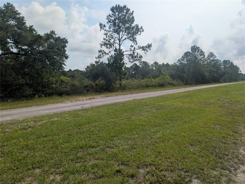 Photo of 810 Palm Avenue, Indian Lake Estates, FL 33855 (MLS # P4939426)
