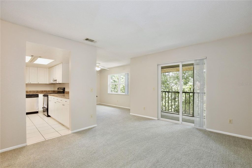Photo of 9825 Turf Way #7, Orlando, FL 32837 (MLS # O6415247)