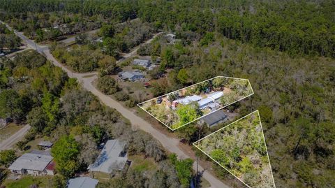 Photo of 19215 National Forest Sr 573, Altoona, FL 32702 (MLS # O6394480)