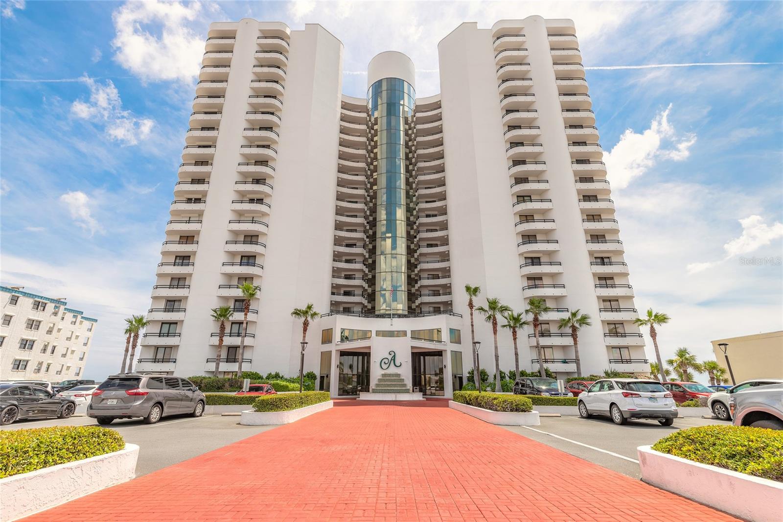 Direct Oceanfront Perfection at The Ashley! Welcome to this immaculate, fully updated 2-bedroom, 2-bathroom condo showcasing breathtaking 180-degree ocean views. Situated in one of the most desirable oceanfront buildings in Daytona Beach Shores, this residence presents a rare opportunity for luxury coastal living or a prime short-term rental investment, with a flexible two-week minimum rental policy. Inside, you’ll find an inviting open floor plan with wood-look tile flooring throughout, two tastefully renovated bathrooms, and new triple sliding glass doors that open to an expansive private balcony, perfect for soaking in the stunning ocean vistas. The impact-rated glass provides both durability and energy efficiency for peace of mind. Enjoy resort-style amenities including a heated oceanfront pool, hot tub, sauna, fitness center, game room, and a penthouse-level community room offering sweeping views of the coastline. Additional features include two underground parking spaces and a pet-friendly policy allowing up to two pets (20 lbs max each). Whether you’re searching for a personal retreat or a high-performing investment, this oceanfront gem delivers it all. All information is deemed reliable but not guaranteed. Buyers are encouraged to verify all details.