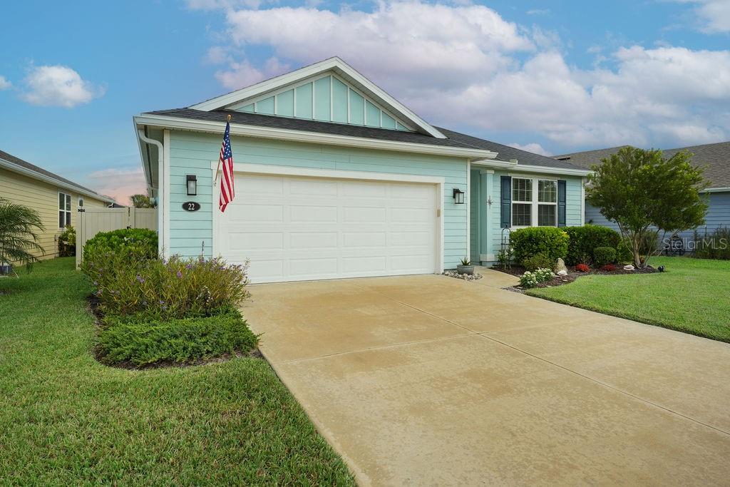 Photo of 22 Las Casitas Boulevard, Palm Coast, FL 32137 (MLS # FC322347)