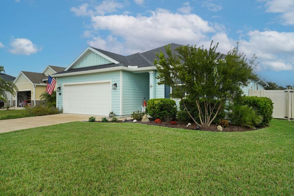 Photo of 22 Las Casitas Boulevard, Palm Coast, FL 32137 (MLS # FC322347)