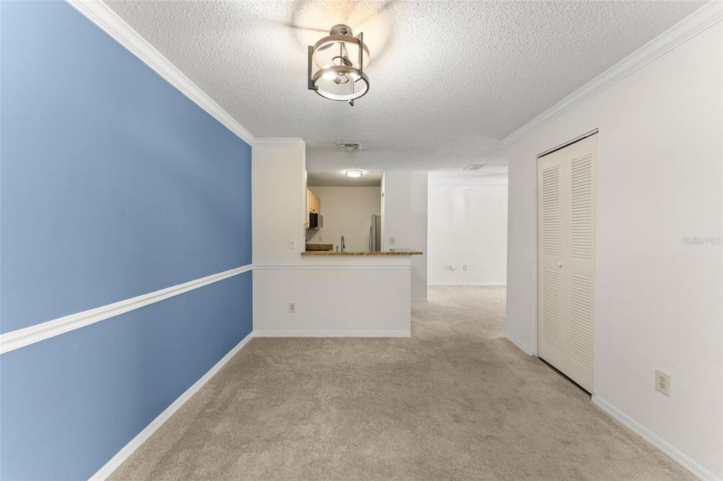 Photo of 1949 Summer Club Drive #211, Oviedo, FL 32765 (MLS # O6449588)