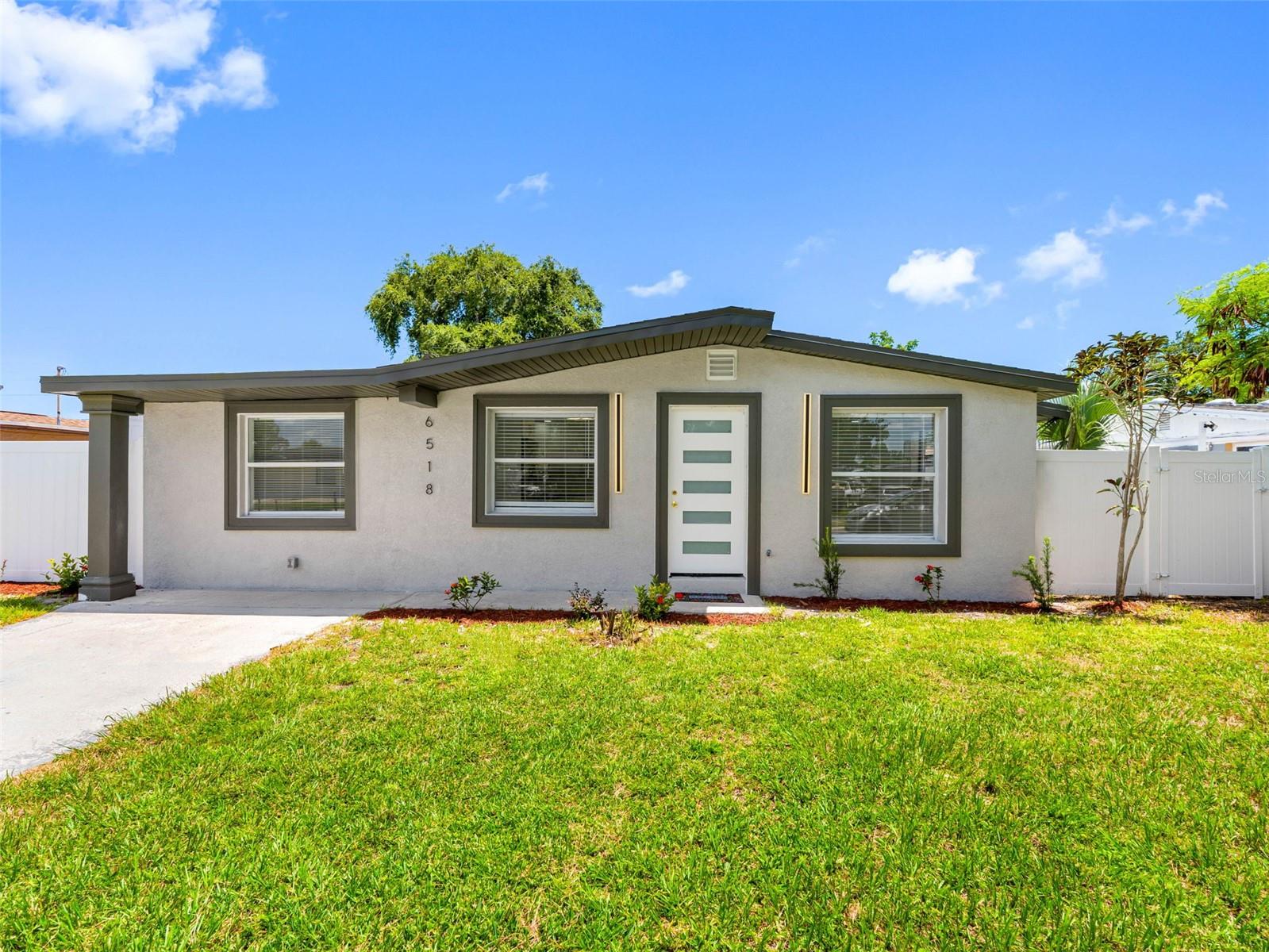 Must to see !!!!! an impeccably renovated 5-bedroom, 3-bath the neighborhood offers a serene area . This move-in-ready home was extensively updated in 2025, a new HVAC condensing unit, water heater, new roof new pluming ,new fence , interior doors and new flooring throughout. The kitchen boasts new wood cabinetry, stainless steel appliances, and updated hardware. Additional upgrades include fresh interior and exterior paint, updated doors and closets. Centrally located just minutes from Tampa International Airport, major shopping and dining, entertainment venues, and world-renowned beaches, this home offers the ultimate in convenience and lifestyle. Don't miss the opportunity to own a beautifully updated in one of Tampa's most sought-after waterfront communities!