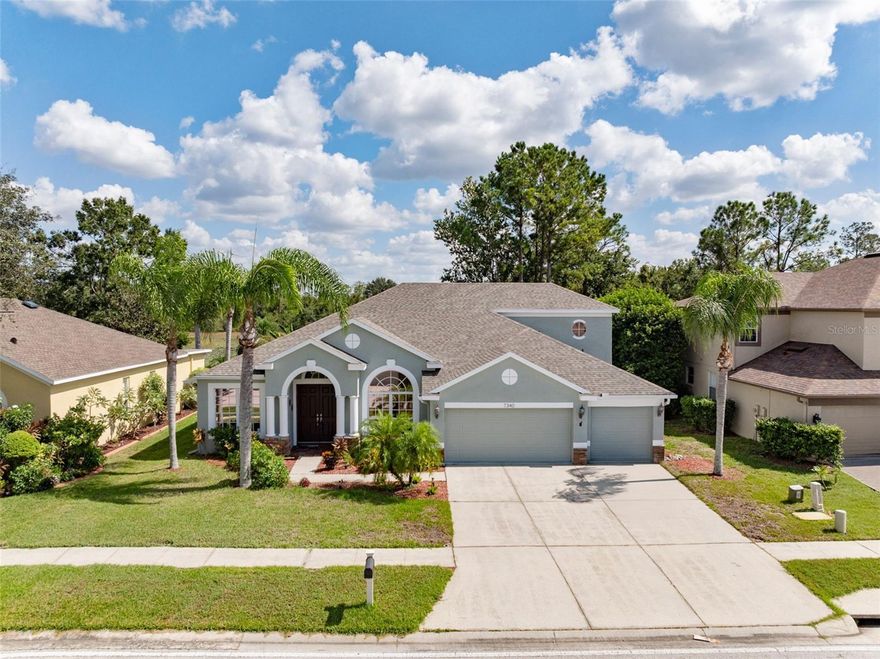 Welcome to an exceptional opportunity to own a beautiful 5-bedroom home offering both pond frontage and a private pool. This rare combination of features makes this property perfect for families, entertaining guests and enjoying tranquil views in a serene natural setting. This amazing home has it all… 3139 sqft, 5 bedrooms, 4 baths, OFFICE, LOFT, 3 car garage, infinity view salt system POOL, screened lanai with covered area, WATERFRONT, landscaped yard and gorgeous views. The master suite is located on the first floor along with 3 other bedrooms and the office while the upstairs is perfect as an in-law suite with its own loft/living room, private bedroom and bath. The kitchen features a breakfast nook with views of the pond and pool, a breakfast bar, an island, and an open layout that connects to the family room. The formal living room, formal dining area, kitchen and family room all offer excellent views of the pool, pond and conservation area. Split bedroom floor plan with 3 secondary bedrooms, 2 full baths and a student study area with a built-in desk located separately from the master suite all on the first floor. The master suite has sliders to the lanai, views of the water, master bath with dual sinks, garden tub, large walk-in shower and a walk-in closet. The private office has French doors and a beautiful built-in desk. The screened pool, added in 2019, features an oversized brick paver deck ideal for entertaining. Additional features: ROOF 2024, exterior paint 2025, electric pool heater 2025, water softener 2019, water heater 2025, new gutters 2024, salt cell for pool 2025, downstairs AC 2022, irrigation system, overlooks preserve with lots of wildlife, crown molding, custom trim work, pool bath, sliders in the formal living room and family room, all appliances included, laundry room with deep sink and a central vacuum system. Entertaining made easy with multiple surround sound speakers in the family room, master nedroom and outside pool deck area.  Outstanding Wilderness Lake Preserve is a highly sought after community in Land O Lakes that offers top notch amenities including the Wilderness Lodge, a lakefront recreation center featuring an Olympic size pool, lap pool, beautiful lake with dock for fishing and kayaking, nature trails, kid splash pad, three story treehouse playground, tennis courts, basketball, fitness center, movie theatre, gardens, gathering area with fire pit, a nature room and a game room. Great location near excellent schools, shopping, restaurants, entertainment and recreation. Wilderness Lake spans 630 acres with nearly half dedicated to conservation areas. The community is centered around a 38-acre spring fed lake providing a serene environment for residents. This property contains the best of indoor and outdoor living. Wake up to the gentle sounds of nature on the pond, enjoy the deer sightings, host memorable pool parties or simply unwind in the spacious interiors.