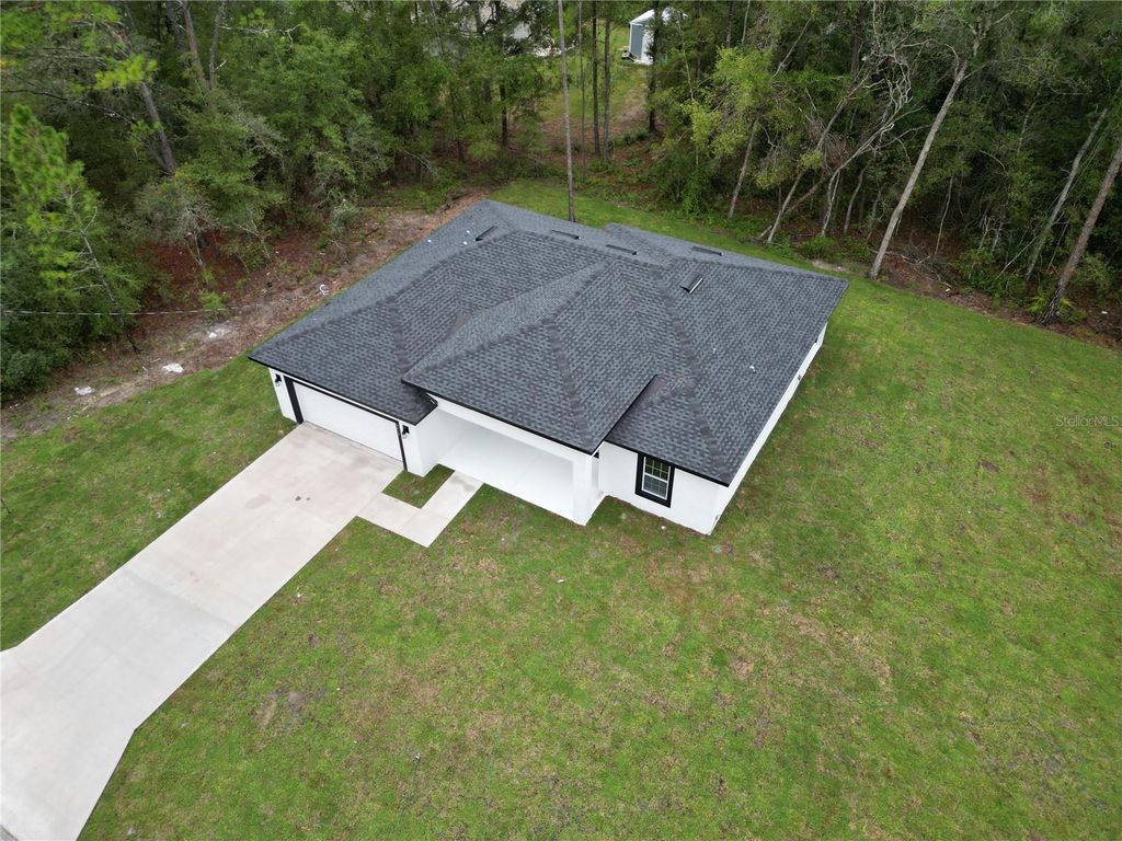 Photo of 8818 N Circular Way, Citrus Springs, FL 34434 (MLS # O6355098)