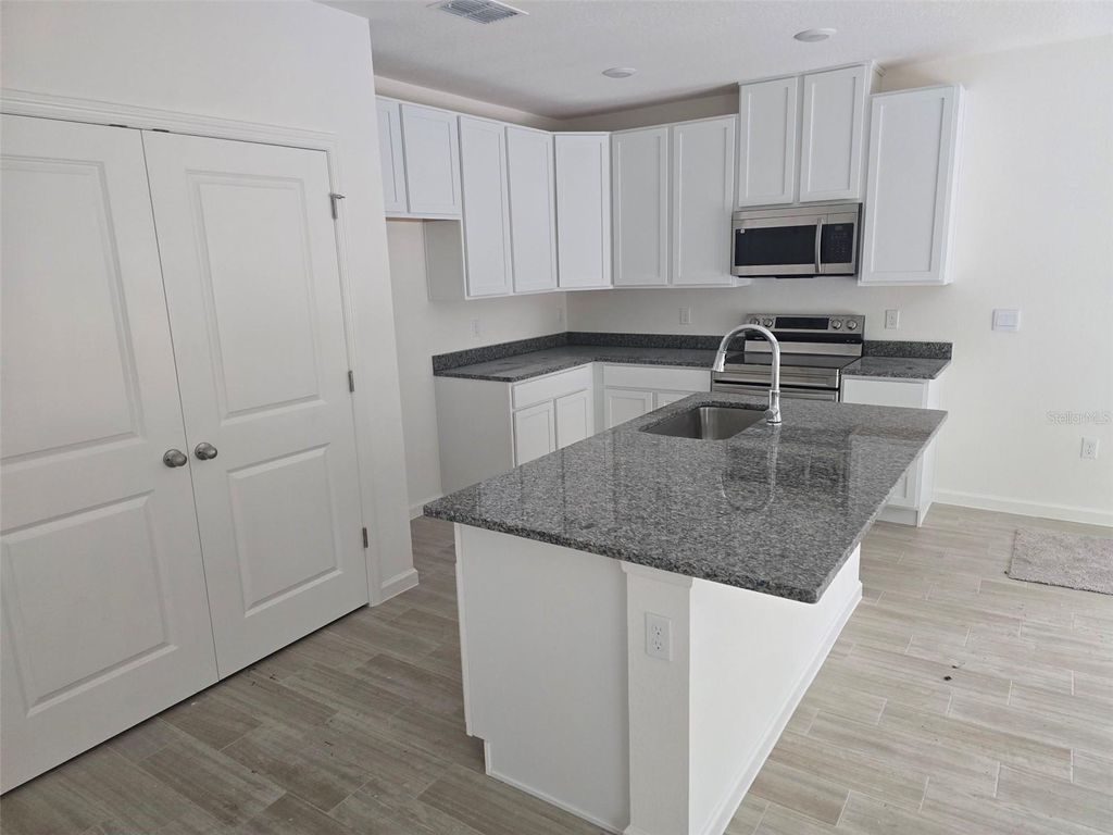 Photo of 1420 Trinidad Street, Deland, FL 32720 (MLS # O6277520)