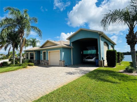 Photo of 656 Meandering Way, Polk City, FL 33868 (MLS # O6349147)