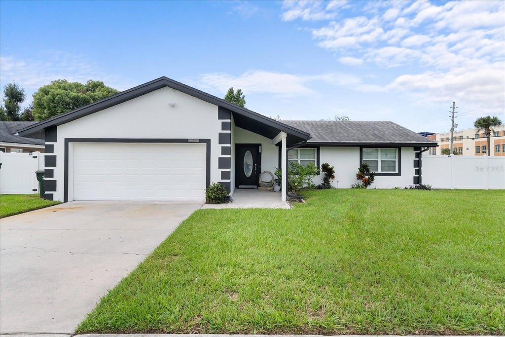 Photo of 1916 Hughey St, Kissimmee, FL 34741 (MLS # S5158215)