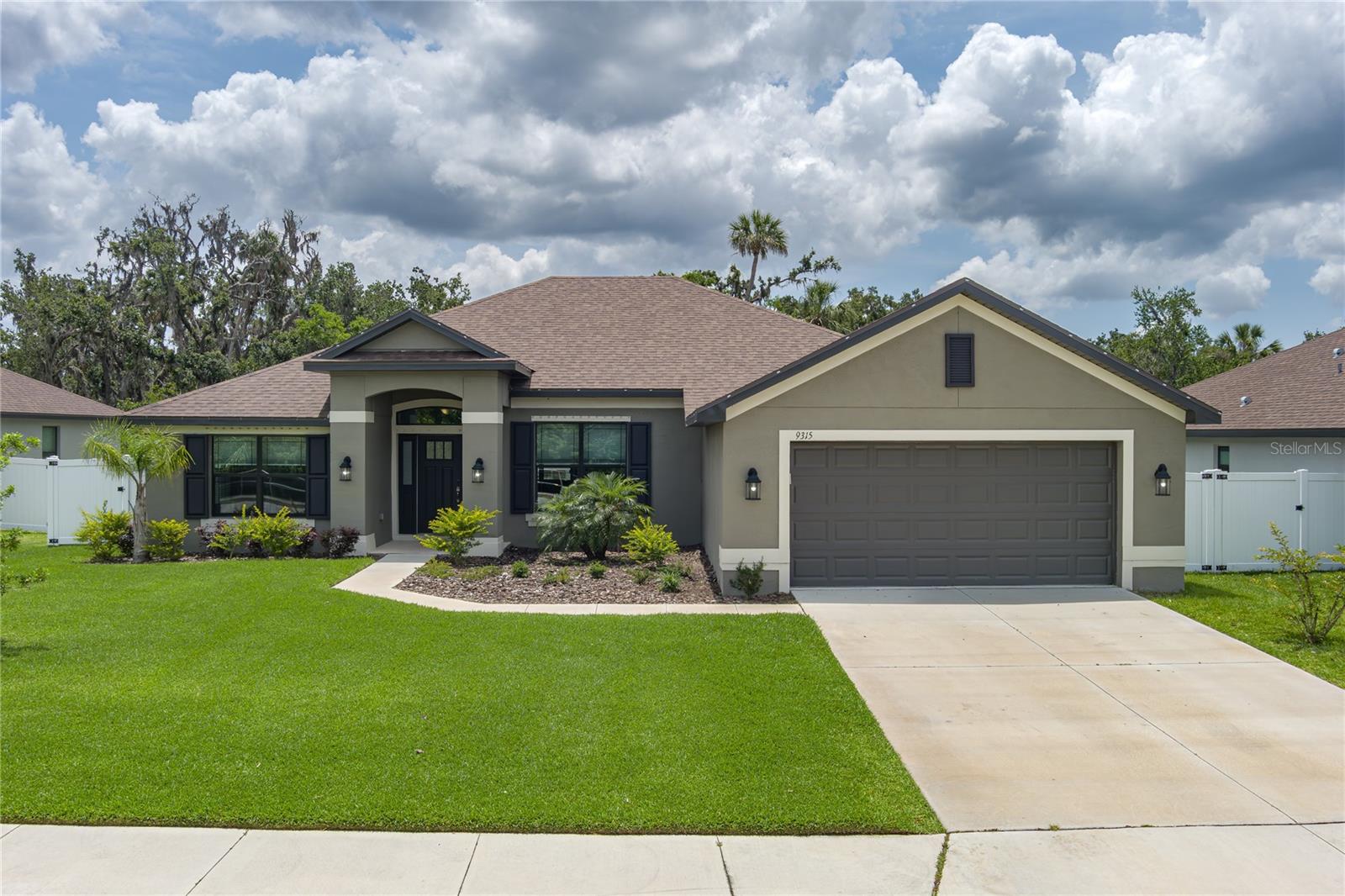 Discover the perfect blend of comfort, elegance, and modern design in this beautifully crafted 4-bedroom, 3-bath home by Adams Homes, located in the desirable community of Grand Oak Preserve in Parrish, Florida. The spacious 2265 floor plan offers a thoughtfully designed layout featuring a grand foyer that welcomes you with a formal living and dining area on either side. The open-concept living space seamlessly connects the family room, dining area, and kitchen, creating an ideal setting for both entertaining and everyday living. The kitchen is sure to impress with modern appliances, abundant cabinet and counter space, and a cozy breakfast nook. The primary suite provides a private retreat with a luxurious ensuite bathroom, dual walk-in closets, and a relaxing garden tub. Three additional bedrooms are generously sized and perfectly suited for guests, family, or a home office, offering both comfort and versatility. A dedicated laundry room and a two-car garage add convenience and functionality. Residents will appreciate that the HOA includes basic cable and internet. This property is also located in Flood Zone X, offering peace of mind with minimal flood risk and typically no lender-required flood insurance. Enjoy an unbeatable location just minutes from Ellenton Premium Outlets, local dining, and exciting new restaurants and shops coming to the area, with easy access to I-75, the beaches, the Skyway Bridge, Bradenton, Sarasota, Tampa, and St. Petersburg. Don’t miss your opportunity to make this exceptional home yours. Schedule your private showing today.