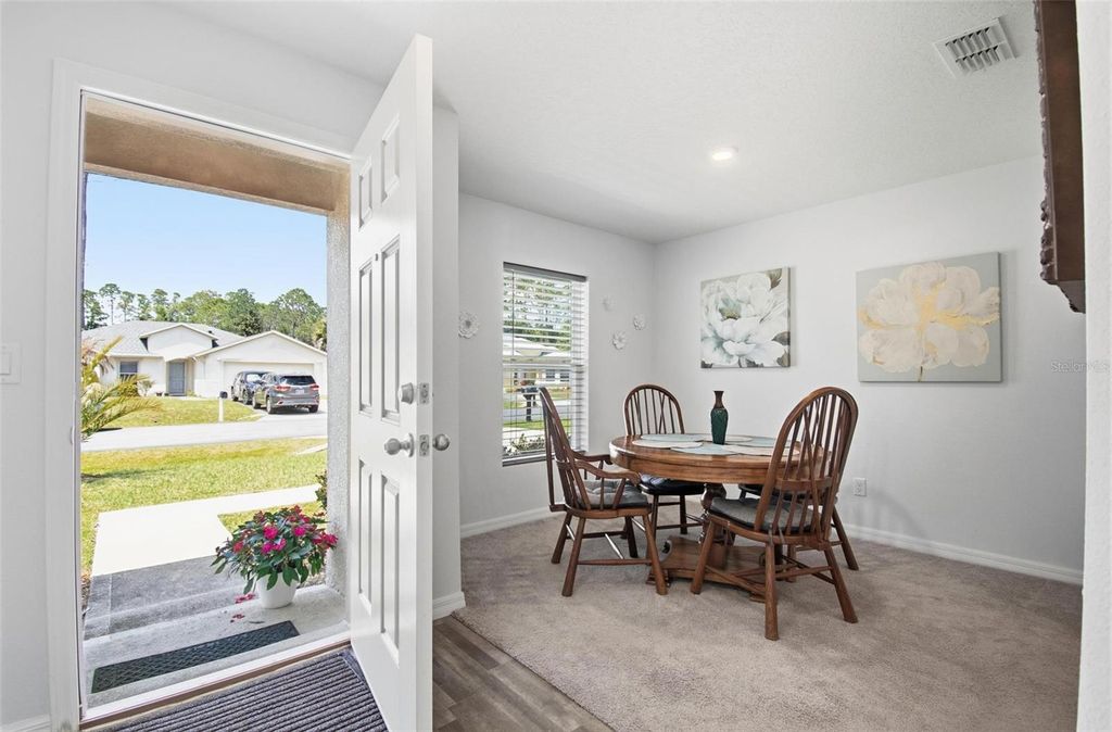 Photo of 8 Post Oak Lane, Palm Coast, FL 32164 (MLS # FC317309)