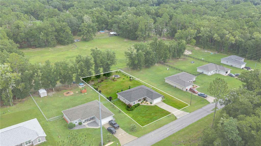 Photo of 19855 SW 59th Lane, Dunnellon, FL 34431 (MLS # OM730004)
