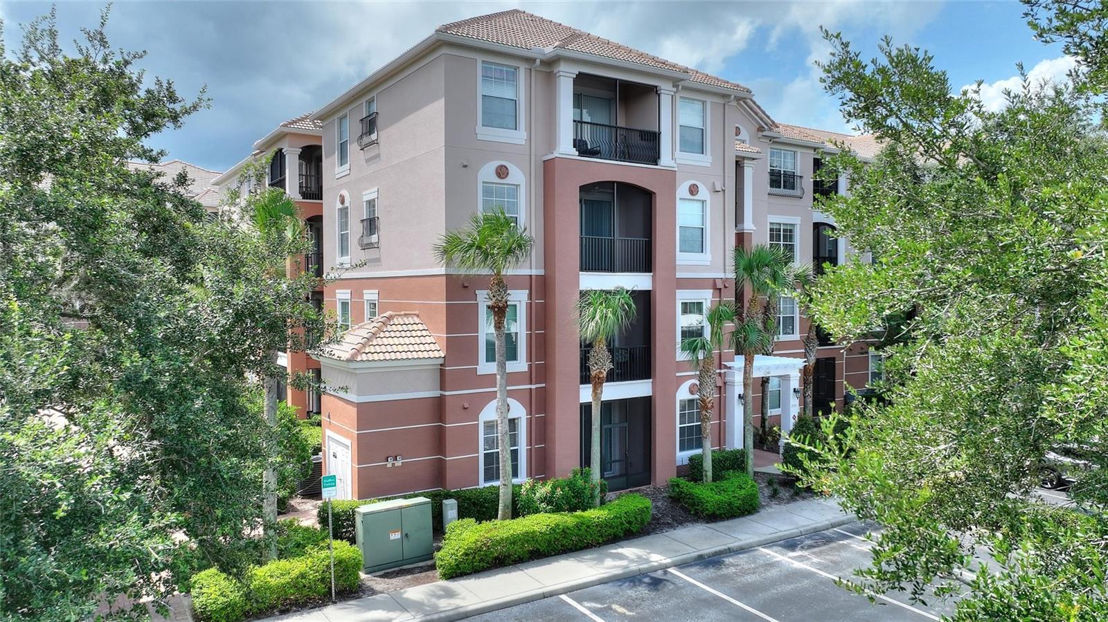 Step into luxury living at 1351 VENEZIA CT, #101 in Champions Gate, Florida! This exquisite
3-bedroom, 2-bathroom condo awaits your arrival in the prestigious Bella Trae community. Neutral colors and immaculately maintained, revel in the tranquility of a serene pond view from your ground-floor haven. Inside, discover a seamless blend of style and comfort with tiled wet areas and plush new carpeting and freshly painted throughout the living spaces. The kitchen boasts sleek, tall cabinets for ample storage and gleaming stainless-steel appliances including a range, refrigerator, microwave, and dishwasher. Convenience is key with a covered parking space and a storage unit complete with power and light. Plus, HOA dues cover internet, cable, water, and pest control for added peace of mind. Indulge in the Bella Trae. Also, a plus is Brand New A/C! Schedule your private viewing for this great unit and community today!
lifestyle with exclusive access to a remarkable 12,000+ sq. ft. clubhouse featuring a state-of-the-art gym, fitness studio, zero-entry pool, media room, billiards room, bocce ball court, putting green, and an array of social activities. Nestled in the heart of Champions Gate, this property offers proximity to Disney Parks, I4, restaurants, shopping, and more. Ready for immediate occupancy and being sold as-is, seize this extraordinary opportunity for upscale living!