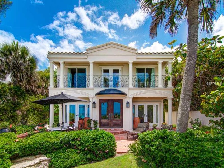 One of the most charming gulf to bay residences on Casey Key, "Casa de Blanco" offers a flexible floor plan designed for comfortable living and entertaining. Cooking with family and friends is a breeze with ample amenities in the marble-countered kitchen which opens conveniently to the living/dining areas. A Santa Fe style fireplace with wrap around seating is the focal point of the great room. Two en suite bedrooms are situated on the ground level while the master spans the width of the 2nd floor and has a well appointed bath with Waterworks fittings. Enjoy the gulf and bay views from the cantilevered deck on the north side of the home with its own cozy fireplace. The pool casita offers another relaxing area to enjoy the outdoor views. Boating enthusiasts will appreciate the dock and deep boating water, and if you enjoy walking the beach, there are eight unspoiled miles here to delight your passion.