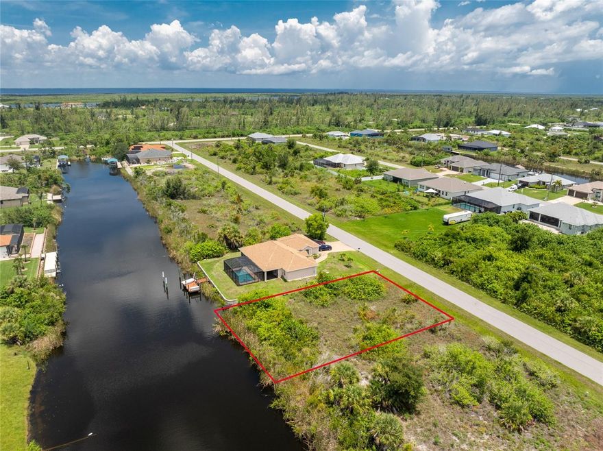 Waterfront lot in desirable South Gulf Cove with direct boating access to Charlotte Harbor and the Gulf! This prime homesite offers peaceful canal views, plenty of room for your dream home, and the convenience of docking your boat right in your backyard. South Gulf Cove features 50+ miles of navigable waterways, a community boat ramp, and parks. Just minutes to Major League Baseball Spring Training, world-class golf, local restaurants, shopping, and Gulf beaches. A perfect location to enjoy the Florida lifestyle—whether building now or investing for the future!