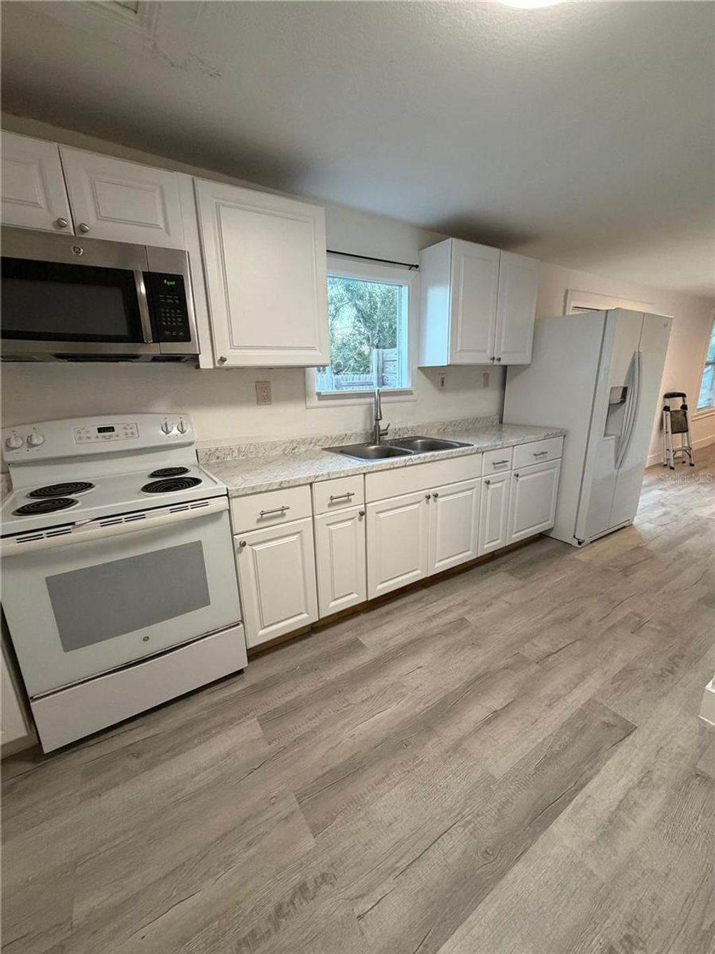 Photo of 3708 Orient Road, Tampa, FL 33619 (MLS # TB8433693)