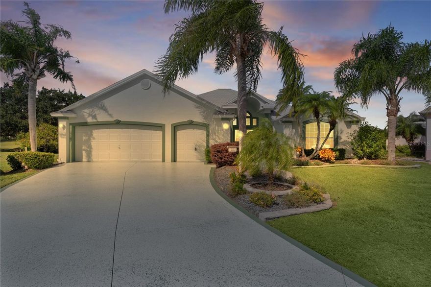 Welcome home to this gorgeous Golf Front Home on the second hole of the Tierra Del Sol Championship Golf Course in The Villages, the world's largest 55+ community. You'll notice the highly desired two car plus golf cart garage, mature landscaping, hardscaping, freshly painted driveway, sidewalk and exterior of the home as you approach with a grand entry through double doors. Once inside, your eyes will be drawn to the stunning golf course and lake views just beyond your private pool and spa under a beautiful birdcage. Natural light floods the interior of the home through multiple windows. High ceilings expand the living area and the freshly painted light and bright walls and painted ceilings allow the natural light to illuminate the entire home beautifully. New, high-end luxury plank flooring adds the simple elegance that makes you feel right at home. The large, eat-in kitchen is bright and airy and provides another stunning view from your breakfast nook with sliding doors giving access to your covered patio and pool deck. Situated off of the kitchen, you'll love this versatile space (formal dining room) with double pocket doors which, due to its privacy, could be used as an additional entertaining space, office space or even a guest bedroom. The possibilities are endless! Your primary bedroom ( located on the opposite side of the home) is expansive and bright with its own grand double door entry. The en-suite bathroom has a large walk-in closet, double sink vanity and stand up shower. Sliding doors allow access and additional light and views to the patio/pool deck. The guest suite is located at the front of the home for maximum privacy with a beautiful window and lots of natural light. The guest bathroom has a tub/shower combo perfect for guests of all ages. The garage floor has a new epoxy coating and the inside laundry room adds convenience. Located on a cul-de-sac with an oversized lot, you'll enjoy the grandeur and privacy. Close to Spanish Springs and Lake Sumter Landing, this location has it all. ROOF is 2022. The BOND is paid. Start living the retirement life you've dreamed of today!