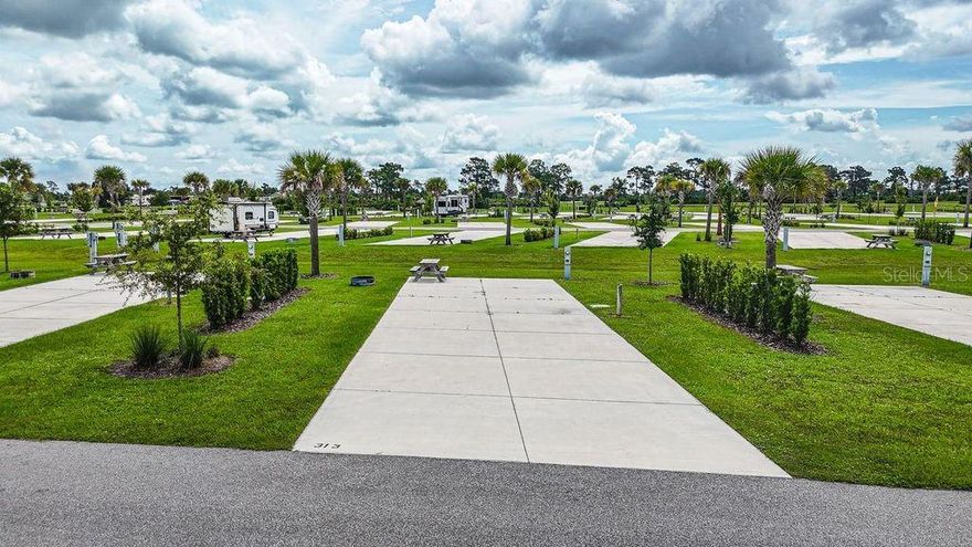 Discover an exceptional opportunity to own a slice of luxury in one of Central Florida’s most sought-after RV resorts at Resort at Canopy Oaks. Whether you're seeking a refined personal retreat or a professionally managed income-producing property, this rare deeded 45’ x 90’ RV lot offers the best of both worlds.

Lot 313 is centrally located within the resort and features a fire ring and picnic table, making it perfect for relaxing outdoors. The site is ready for your RV and offers flexibility to customize the space to suit your preferences and style. The generous 20’ x 70’ concrete pad features full hookups (20/30/50 amp) and easily accommodates Class A, Class C, fifth wheels, travel
trailers, or even a small park model—making it the perfect carefree seasonal retreat.

Located within a breathtaking 435-acre gated retreat, ownership includes full access to an impressive collection of amenities. Enjoy a tropical tiki bar, sparkling pool and hot tub, pickleball courts, a state-of-the-art fitness center, full-service spa, and convenient on-site dining — all thoughtfully designed to deliver an elevated, luxury lifestyle experience.

Enjoy elevated resort living on your terms — with the flexibility to generate rental income when you’re away.

Developer incentives are currently available, adding even more appeal to this remarkable opportunity.