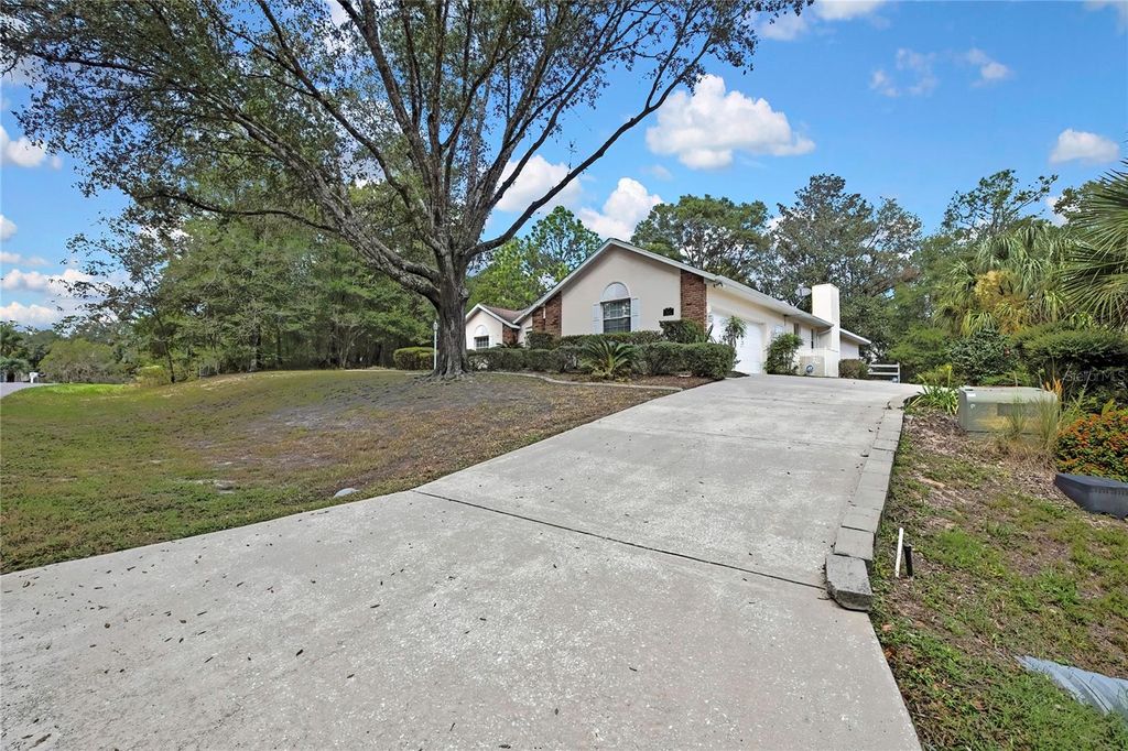 Photo of 19649 SW 93rd Lane, Dunnellon, FL 34432 (MLS # TB8437174)