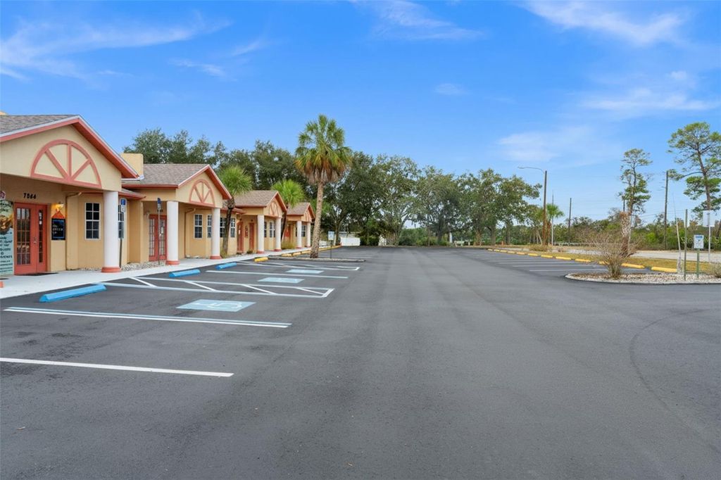 Photo of 7048 Mariner Boulevard, Spring Hill, FL 34609 (MLS # TB8455348)