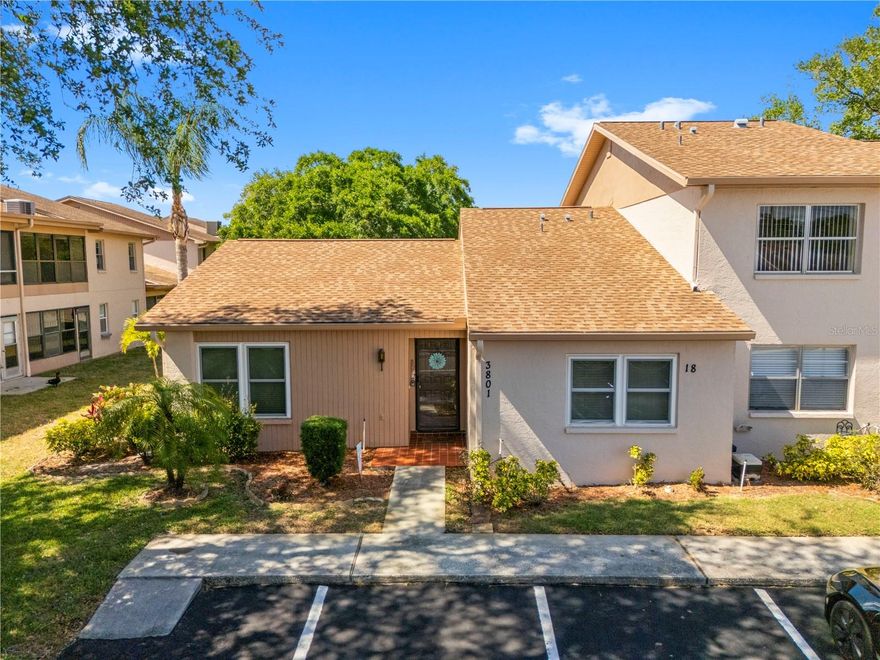Welcome to this well-maintained 2 bedroom, 2 bath condominium in the coastal community of Holiday, offering comfort, convenience, and peaceful living along Florida’s Gulf Coast. Flood insurance is not required because located in zone X500. This single-level home features a functional kitchen with appliances and ample counter space, flowing into comfortable living areas designed for easy everyday living. Major updates include a 2020 HVAC system, 2021 hot water heater, and hurricane-impact windows for added peace of mind and efficiency. Two standout features of this unit is its prime setting overlooking a tranquil lake, offering relaxing water views and added privacy. Unlike other units in the community that back to a busy road or have upstairs neighbors, this single-story layout provides a quieter, more desirable living experience with no one above you. Second, there are guest spots easily accessible along with a carport for the owner to park just outside the front door! This Condo is 1,318 SqFT, but if you add in the Florida Room’s SqFT you have 1,542 SqFT of Entertainment Space making the price point of this unit a RARITY! The home is being sold fully furnished, making it truly move-in ready and ideal as a primary residence, seasonal retreat, or investment property. Residents enjoy nearby access to beautiful outdoor destinations such as Anclote River Park and the stunning beaches of Anclote Key Preserve State Park, as well as the charming waterfront dining and cultural experiences in Tarpon Springs. With its combination of updates, furnishings, lake views, and desirable layout, this condo offers an exceptional opportunity to enjoy relaxed Florida living at its best.