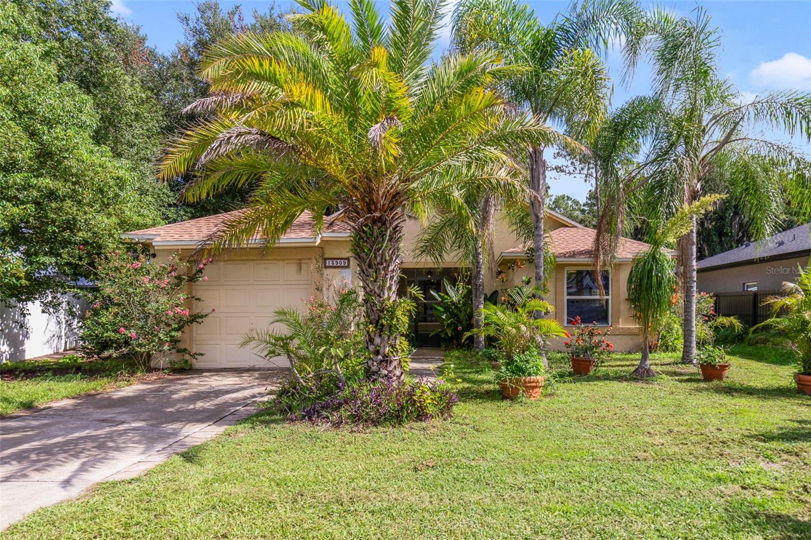 One or more photo(s) has been virtually staged. This property QUALIFIES FOR A CREDIT UP TO $5625 through the seller's preferred lender / Seller may consider buyer concessions if made in an offer ***Located in sought after East Orlando, this single story home offers major updates and big potential! With a NEW ROOF (2023), NEW TANKLESS WATER HEATER, and updated windows (2015), this home is ready and waiting for you to make it your own. Inside you will find high ceilings over open living and dining areas and a functional layout featuring easy care TILE and WOOD FLOORS THROUGHOUT. The light and bright PRIMARY SUITE includes a private en-suite bath, while a BONUS ROOM complete with a closet offers flexibility as a THIRD BEDROOM, home office or hobby space. The kitchen is comfortable and practical, delivering pantry storage, STAINLESS STEEL APPLIANCES (new microwave, stove and fridge!), a breakfast bar pass-through to the dining area and enough room for a breakfast table. The outside of the home boasts a large SCREENED LANAI that overlooks a FENCED BACKYARD with MATURE TREES for plenty of shade and a storage SHED for added convenience. Perfectly situated in a small enclave of just 100 homes, the Ginger Creek community has a super LOW HOA and an unbeatable location near UCF, Waterford Lakes, Oviedo and Avalon Park. You will enjoy quick access to SR 50 via Lake Pickett Rd, and 434, with local shopping, dining, area theme parks and beaches all within easy reach. Whether you are a first time buyer ready to roll up your sleeves and make it your own, or an investor looking for a high demand area – this home is a fantastic opportunity in one of East Orlando’s most desirable pockets. Call today to schedule a tour!