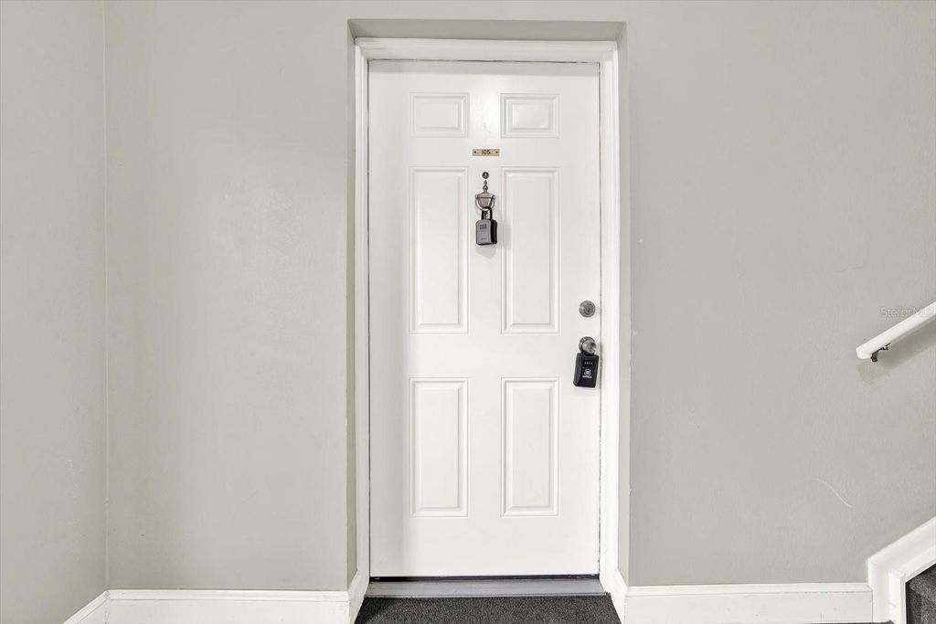 Photo of 9130 Tudor Drive #M105, Tampa, FL 33615 (MLS # TB8486120)