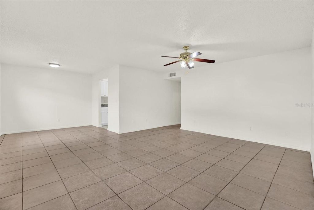 Photo of 9130 Tudor Drive #M105, Tampa, FL 33615 (MLS # TB8486120)