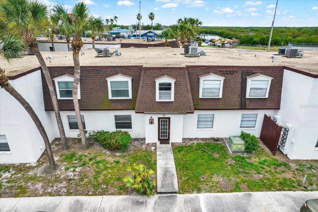 Photo of 9130 Tudor Drive #M105, Tampa, FL 33615 (MLS # TB8486120)