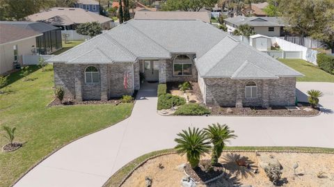 Photo of 44 Wellstream Lane, Palm Coast, FL 32164 (MLS # FC316996)