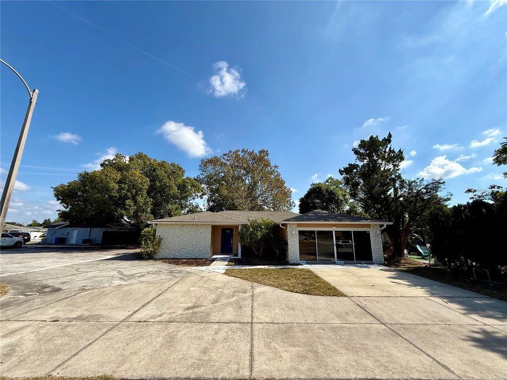 Photo of 9330 Regency Park Boulevard, Port Richey, FL 34668 (MLS # W7880950)