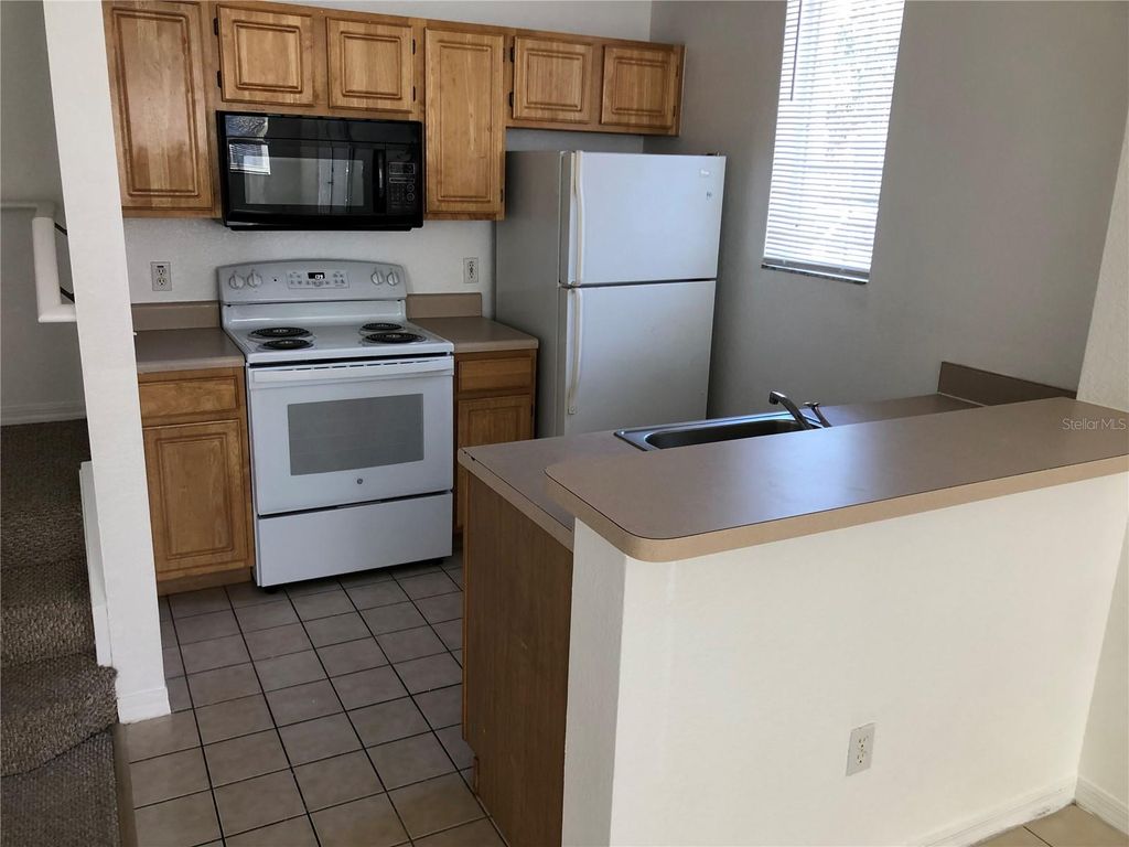 Photo of 4004 Venetian Bay Drive #108, Kissimmee, FL 34741 (MLS # O6388738)