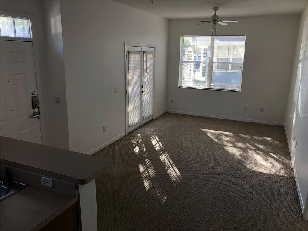 Photo of 4004 Venetian Bay Drive #108, Kissimmee, FL 34741 (MLS # O6388738)