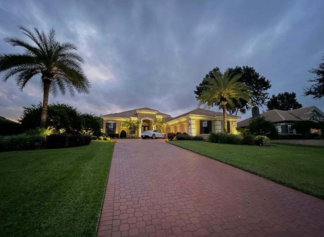BREATHTAKING GOLF COURSE VIEWS on Lake Jovita’s South Course, rated #16 and one of Florida’s “must-play” courses! DESIGNER POCKET SLIDERS open the home to views of velvety-smooth greens. 13’ soaring DOUBLE TRAY CEILINGS trimmed with crown molding in the main rooms set the tone for luxurious Florida living. Guard-Gated Community with Resort style amenities! CLOSE TO TAMPA WITHOUT THE TRAFFIC! Welcome to the rolling hills of Lake Jovita, a Golf and Country Club community. Discerning buyers will appreciate this well-appointed home situated on a ½ acre lot, with 4 bedrooms PLUS A DEDICATED HOME OFFICE/DEN, 3 baths, 3 car garage and Swimming Pool. As you enter you’ll be struck by the sweeping open floor plan and panoramic golf course views of the 17th fairway. This home was built for entertaining. The open-concept floorplan seamlessly connects indoor and outdoor living. The spacious kitchen offers an abundance of solid wood cabinetry and granite countertops, breakfast bar, generous center island for meal prep, coffee bar and wine cabinet. It opens to the family room, which has STUNNING disappearing corner sliding glass doors and TRANSOM WINDOWS providing an abundance of natural light. Open up the FULLY POCKETING SLIDING DOORS and bring the outdoors in. Take the party outdoors to a breathtaking backyard oasis, where heated pool with spa create a serene escape. Enjoy al fresco dining at the outdoor kitchen or unwind in one of two covered areas with TV’s overlooking the golf course. The primary suite, secluded on one side of the home, offers pool access. The spa-like ensuite bathroom features his/hers walk in closets, dual sinks, vanity seating, soaking tub, and walk-in shower. Adjacent to the primary suite, the HOME OFFICE WITH distinctive GLASS door and windows adds style and elegance. Bedrooms 2 and 3 located on the opposite side of the home share a guest bath. Bedroom 4 boasts it’s own bathroom (pool bath) and a separate entrance, an ideal setup for visitors, in-laws, and multi-generational living! Other custom features include one of a kind, handmade front glass doors, Plantation Shutters, 3M security/tinted glass on all windows and sliders, butler's pantry. The 3 car garage allows ample space for both cars and golf cart and a long, paver driveway offers extended parking . And an irrigation well keeps the lawn and landscaping lush, without the huge water bill. Lake Jovita’s South Course was designed by PGA Tour star Tom Lehman, and boasts the largest elevation change of any hole in Florida (hole #11). The course features tight fairways lined with majestic oak trees and many natural water hazards. Due to its challenging play and natural beauty, it has hosted The PGA Tour Qualifying School since 2000 and is a US Open and US Women's Open qualifying site. LAKE JOVITA is a resort-style community with a 24-hour manned gate and low HOA fees, a playground, park, har-tru tennis courts, pickleball courts, community pool, walking trails and dedicated dog park. Optional membership packages include access to 2 world-class 18-hole golf courses, Junior Olympic-sized pool, fitness center, clubhouse, restaurant, social clubs! This is refined Florida living in one of Tampa’s most desirable communities. Located just 5 miles from I-75, with easy access to 2 international airports. Don’t miss your opportunity to own this distinctive home and enjoy all that Lake Jovita and the Greater Tampa & Orlando Regions have to offer.