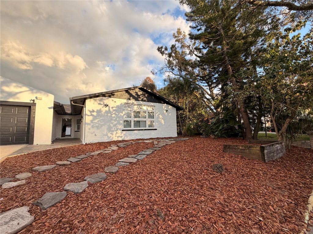 Photo of 7513 Rustic Drive, Tampa, FL 33634 (MLS # TB8463078)