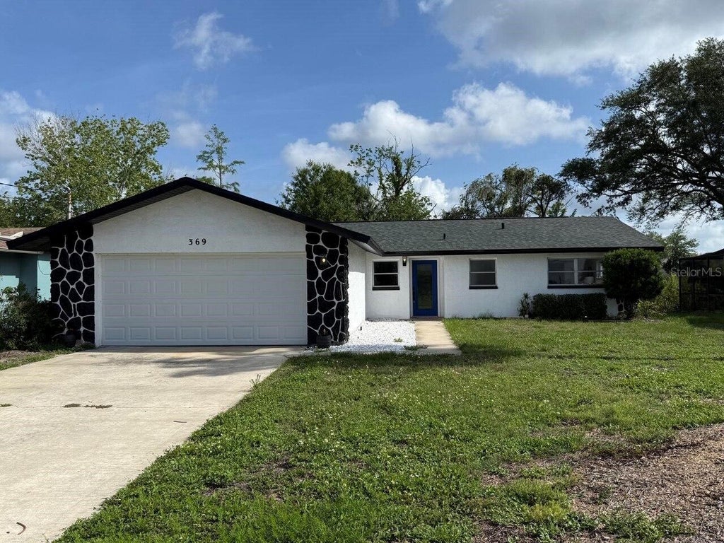 Photo of 369 Westwinds Drive, Palm Harbor, FL 34683 (MLS # O6414218)